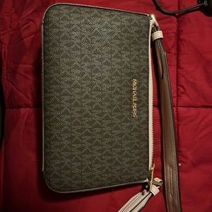 Never been used brown and pink small MK purse